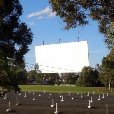 Giant outdoor cinema projection screen in park